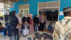 Pererat Silaturahmi Melalui Tradisi, Bhabinkamtibmas Polsek Loa Kulu Hadiri Ritual Sedekah Bumi di Desa Sumber Sari