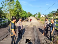 Wujudkan Kepedulian Infrastruktur, Polsek Kenohan Resmikan Jembatan Merah Putih di Desa Kahala Ilir