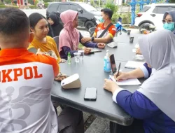 Sapa Pengemudi Ojol di Hari Buruh, Sidokkes Polres Kukar Gelar Cek Kesehatan Gratis