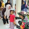 Babinsa Koramil 11 Pebayuran Dukung Program Kesehatan Nasional Lewat Pendampingan Posyandu di Pebayuran