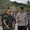 Kapolres Kukar Hadiri Kegiatan Penerimaan Alultista Yon Armed 22/Kesumawira Desa Jembayan