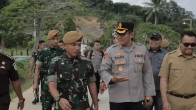 Kapolres Kukar Hadiri Kegiatan Penerimaan Alultista Yon Armed 22/Kesumawira Desa Jembayan