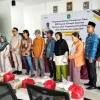 Kapolsek Tenggarong Seberang Hadiri Kegiatan Bantuan Permakanan Tahun 2026 di Tenggarong Seberang