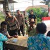 Koramil 10 Sukatani Gandeng Puskesmas Tambelang Gelar Bakti Kesehatan Saat Peresmian Jembatan ARMCO