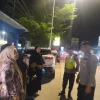 Patroli Dialogis Malam Hari, Polsek Samboja Jaga Konduktifitas Kamtibmas di Wilayah Hukumnya