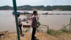 Polsek Loa Kulu Pastikan Lomba Balap Ketinting Festival Budaya Desa Loa Kulu Kota Berjalan Aman dan Tertib