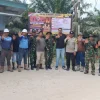 Polsek Kembang Janggut Bersama TNI dan Perusahaan Pasang Spanduk Cegah Karhutla