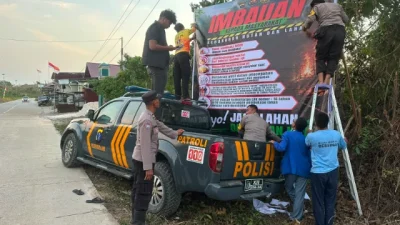 Polsek Muara Jawa Bersama TNI Gencarkan Sosialisasi dan Pemasangan Spanduk Cegah Karhutla