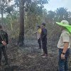 Gerak Cepat Polsek Tenggarong Seberang Bersama Tim Gabungan Jinakkan Karhutla di Desa Separi