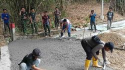 Menyatukan Desa, Menyatukan Harapan: Satgas TMMD Ke-129 dan Warga Bangun Jalan  Sasaran 4 dengan Semangat Gotong Royong