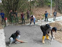 Menyatukan Desa, Menyatukan Harapan: Satgas TMMD Ke-129 dan Warga Bangun Jalan  Sasaran 4 dengan Semangat Gotong Royong