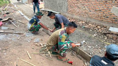 Bakti Nyata Mengalirkan Asa, Satgas TMMD Ke-129 Bangun Jalan untuk Masa Depan Warga